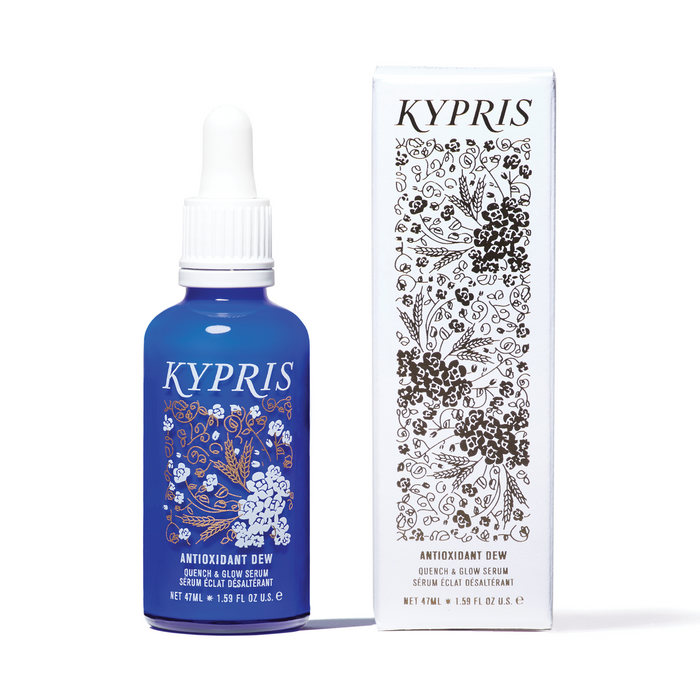 Kypris 'Antioxidant Dew' skin serum next to white box with gold foil floral detailing on white background