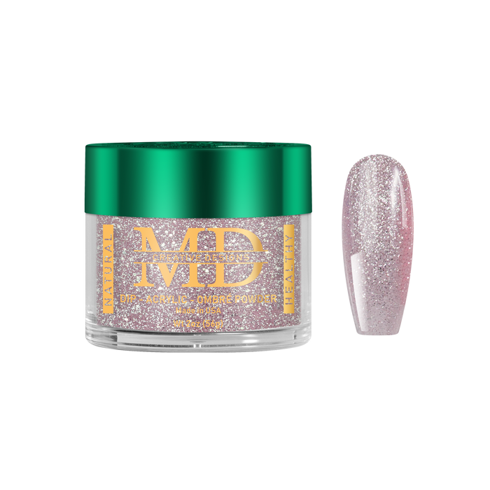 Jar of glittery nail powder with a pink glittery nail tip next to it on a white background