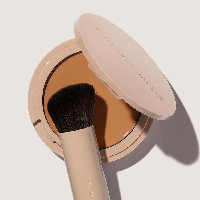 Open No Makeup Makeup FlexShade Foundation compact with a foundation brush