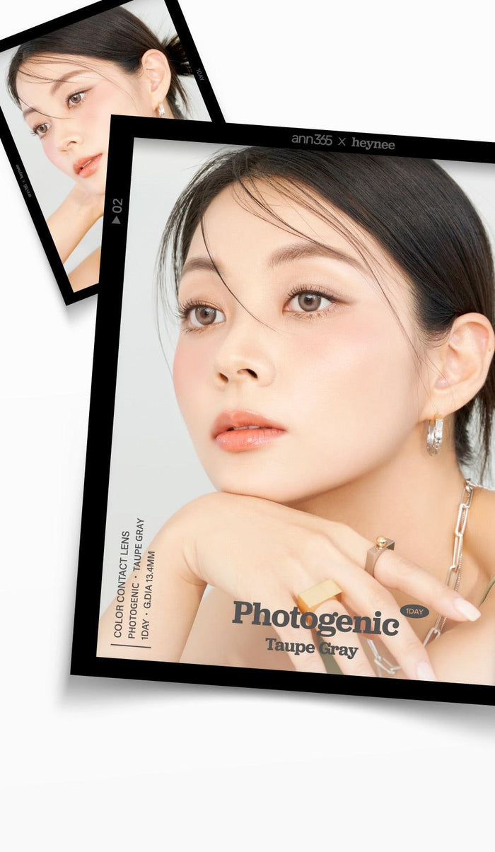 A close-up of a model demonstrating a natural makeup look with Ann365 Photogenic 1-Day Taupe Grey (10pk) circle colour contacts, highlighting how well the contact lenses blend with her dark eyes.