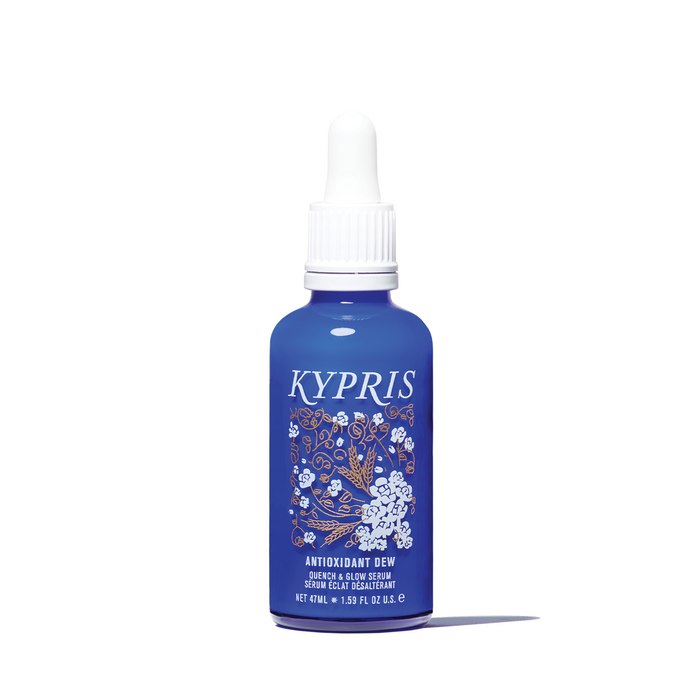 A blue bottle with a white dropper labeled 'Antioxidant Dew' from Kypris Skincare.