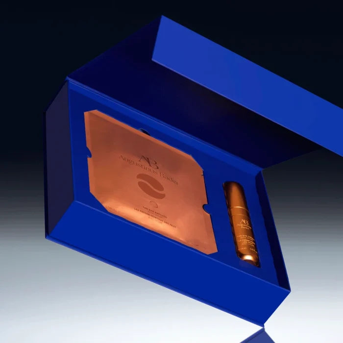 Augustinus Bader Eye Rejuvenating Kit with gold eye patches and eye cream in blue box