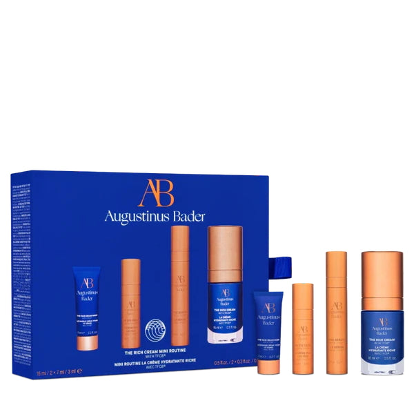 Augustinus Bader The Rich Cream Mini Routine gift set with blue and gold skincare bottles