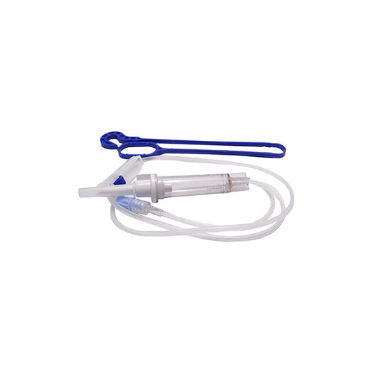 A medical infusion set, consisting of a translucent tube and a chamber, lies coiled on a white background alongside a blue plastic clip.