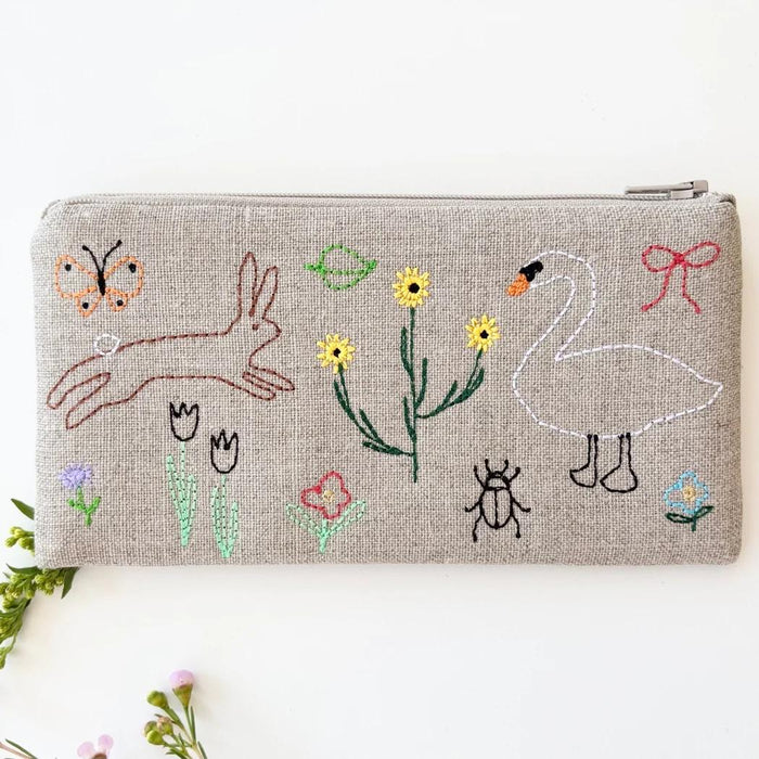 Small linen pouch with zipper, embroidered birds, rabbits, and flowers in multicolor