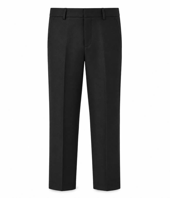 The Capone Crepe Weave TrouserThe perfect complement to the Capone Jacket — or a sharp standalone piece on its own. Crafted from the same premium crepe weave fabric, the Capone Trouser delivers a refined texture and elegant drape that keeps him looking polished from ceremony to celebration.Cut with a tailored, slim fit and a clean flat front, these trousers sit comfortably at the waist and taper neatly through the leg for a modern, put-together silhouette. Designed for boys who mean business — e