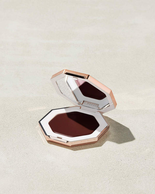 Cheeks Out Freestyle Cream Bronzer shown in shade Toffee Tease
