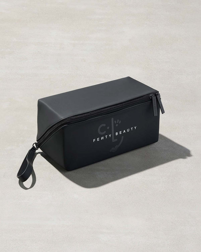 One black rectangular bag with Fenty branding on a gray background