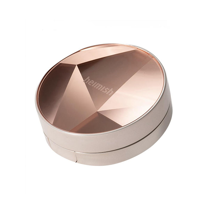 HEIMISH Artless Perfect Cushion + Refill is a lightweight cushion foundation that provides seamless coverage and a natural, radiant finish. Enriched with Niacinamide, it brightens and evens out skin tone, while Rosa Canina Fruit Extract and Thyme Leaf Extract nourish and soothe the skin. The formula blends effortlessly, delivering a smooth, dewy complexion that feels comfortable all day. Convenient and portable, this cushion compact is perfect for on-the-go touch-ups, keeping your skin looking f