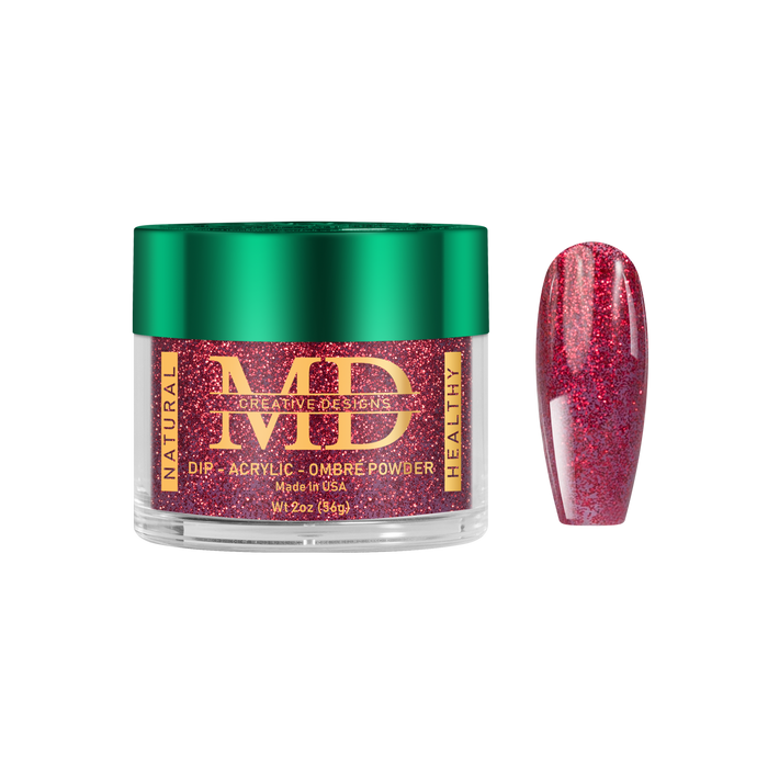 Jar of red glittery nail powder with green lid on a white background