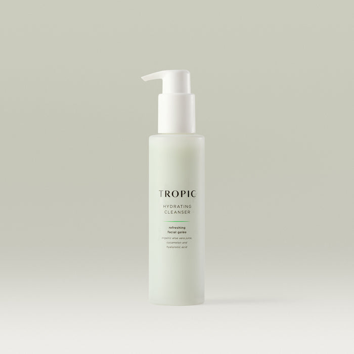 Tropic Hydrating Cleanser bottle with pump dispenser, containing refreshing facial gelée made with organic aloe vera juice, cucumber, and hyaluronic acid, displayed on a neutral background