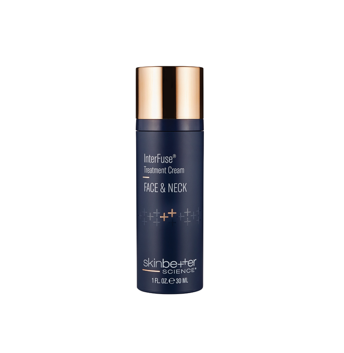 Blue skincare bottle with gold cap on a white background