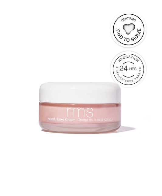 Kakadu Luxe Cream in a small clear jar with a white lid, featuring hydration claims of 24 hours and certified kind to biome for clean beauty skincare.