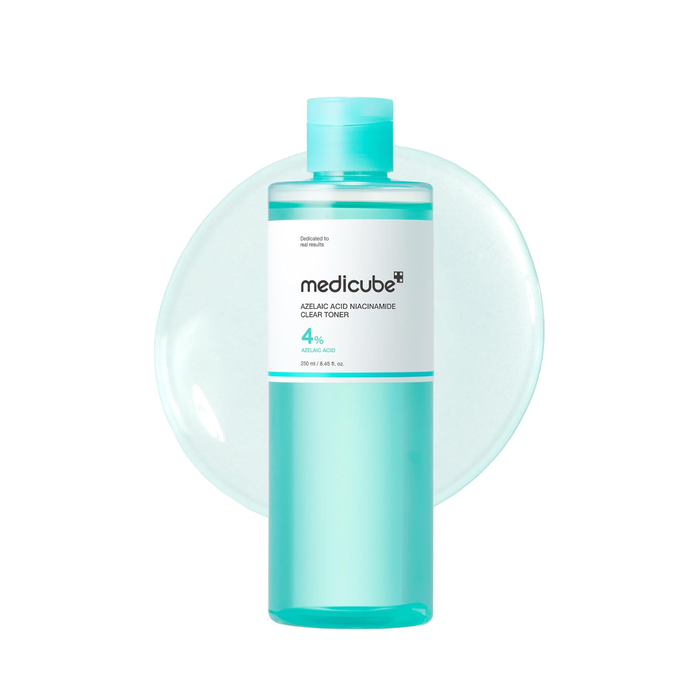 MEDICUBE Azelaic Acid Niacinamide Clear Toner is a gentle, balancing toner designed to help control excess oil while keeping skin calm and hydrated. Formulated with Azelaic Acid, it supports clearer-looking skin and helps improve the appearance of uneven skin tone. Niacinamide works to refine and balance the complexion, while ingredients like Hyaluronic Acid, Aloe Vera Leaf Extract, and Centella Asiatica provide soothing hydration. The lightweight, non-comedogenic formula refreshes the skin with