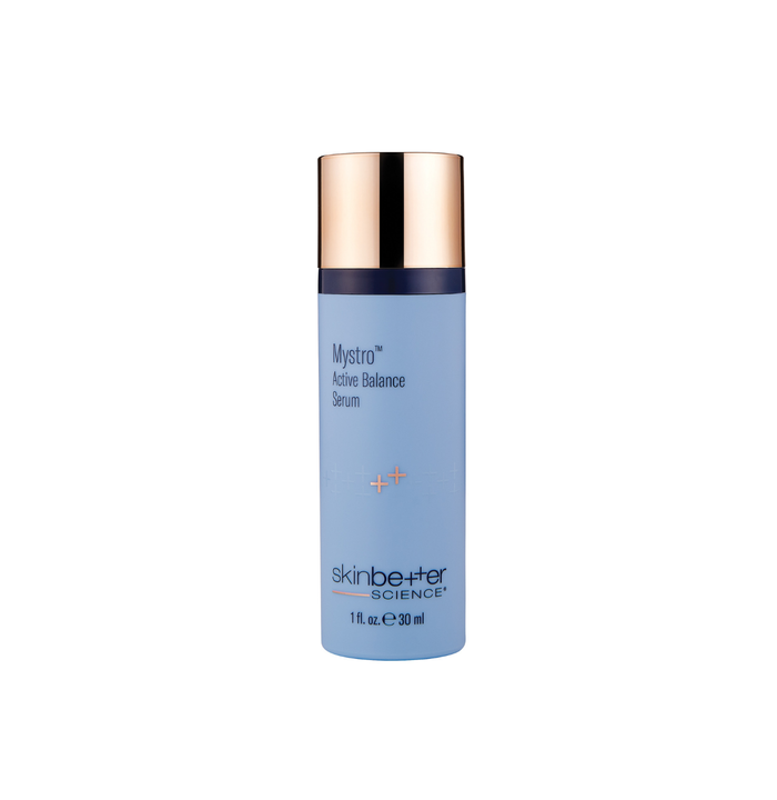 Blue skincare bottle with gold cap on a white background