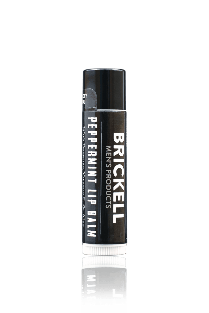 Brickell peppermint lip balm product photo on white marble background