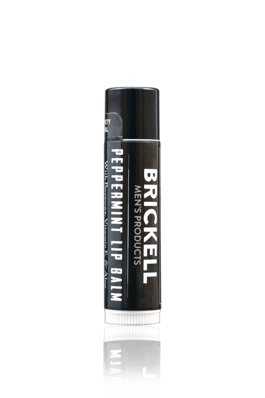 Brickell peppermint lip balm product photo on white marble background