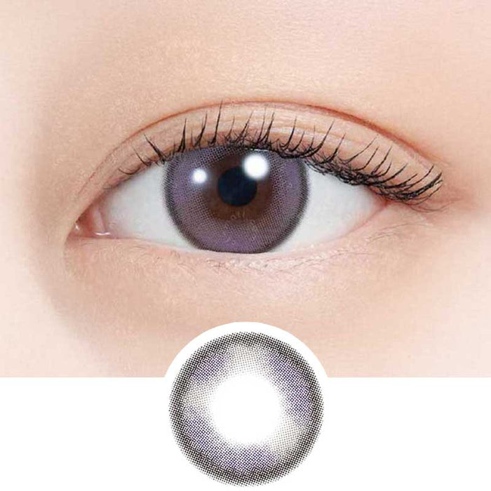 A close-up of a human eye wearing N's Collection Blueberry Jam Violet daily contacts, with a separate image below displaying the lens design.