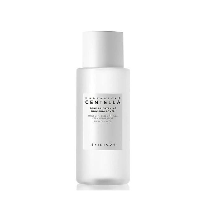 SKIN1004 Madagascar Centella Tone Brightening Boosting Toner is a hydrating and brightening toner formulated with Centella Asiatica Extract to soothe and calm the skin. Enriched with Niacinamide and 2-O-Ethyl Ascorbic Acid, it helps brighten the complexion and improve skin tone. The addition of fruit extracts like Apple, Papaya, and Grape provides gentle exfoliation and nourishment, leaving the skin smooth and revitalized. This toner prepares the skin for better absorption of the following skinc