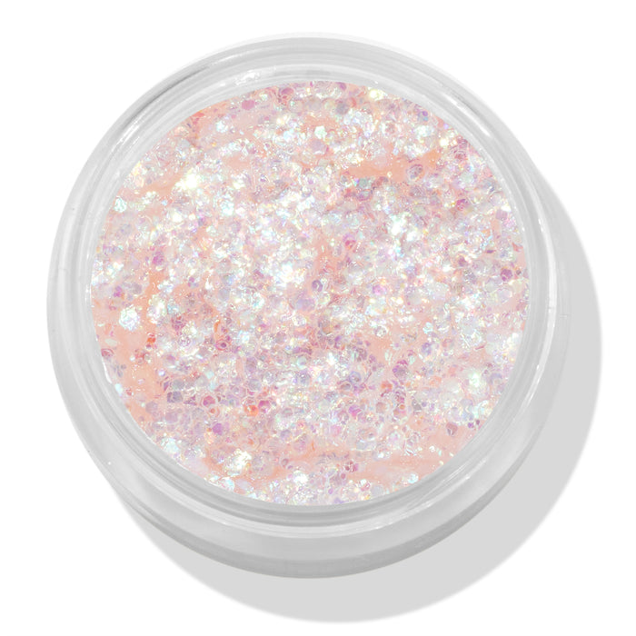So Cute glitter gel shimmers with chunky iridescent flakes in a peachy-clear base, filling a round clear jar; ColourPop Glitter Gel for face and body makeup, shown in a close-up product shot on a white background.
