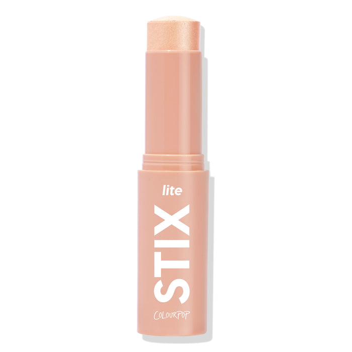ColourPop Lite Stix Sunlight highlighter - twist-up cream stick revealing a warm champagne shimmer - stands upright on a white background in a peach tube with bold white STIX lettering; quick swipe-on glow for cheeks, nose, and brow bone.