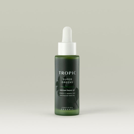 Tropic Super Greens nutrient boost oil. 
Contains Vitamin C, tamanu, kale and broccoli seed oils.  Certified Organic.
White pipette dispenser on dark green glass bottle with embossed leaf design behind white text.