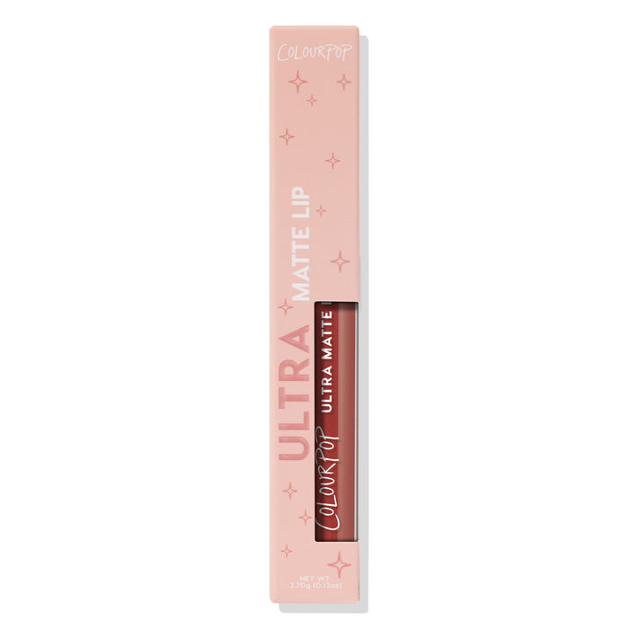 ColourPop Ultra Matte Lip in Toast standing boxed, warm terracotta nude liquid lipstick shown through a pink star-print carton window, tube labeled Ultra Matte, 3.7g/0.13oz, on a clean white background.