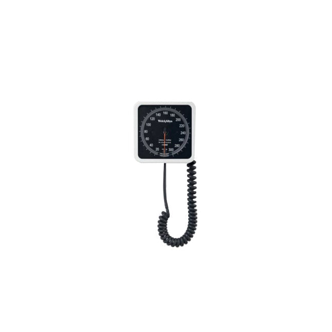 A sphygmomanometer displays a reading against a white background. The coiled cord connects to the gauge.