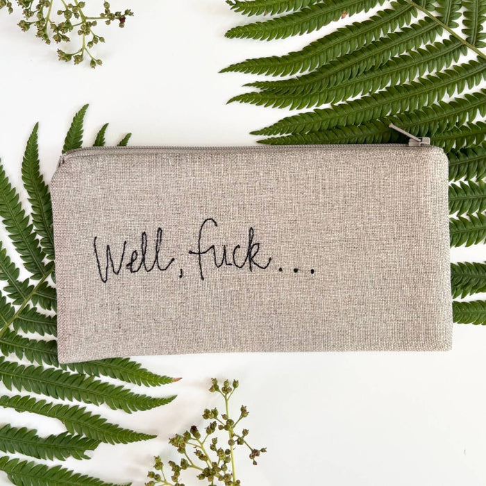 Beige linen zip pouch with 'Well, Fuck...' script on front